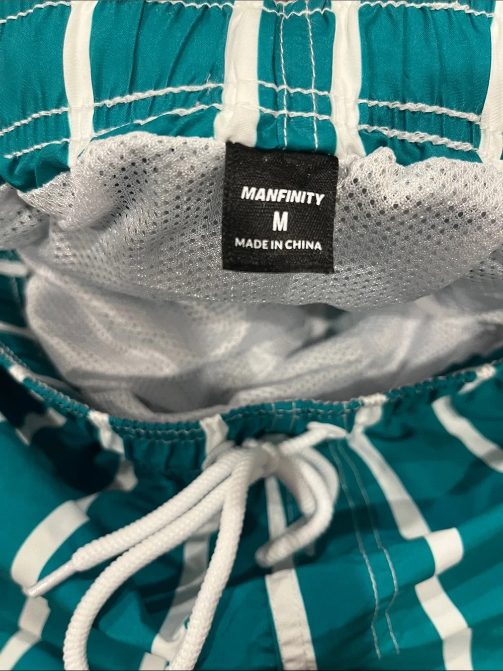 SHEIN Teal and White Vertical Stripe Swim Trunks